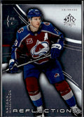 2020-21 Upper Deck #12 Nathan MacKinnon Triple Dimensions Reflections